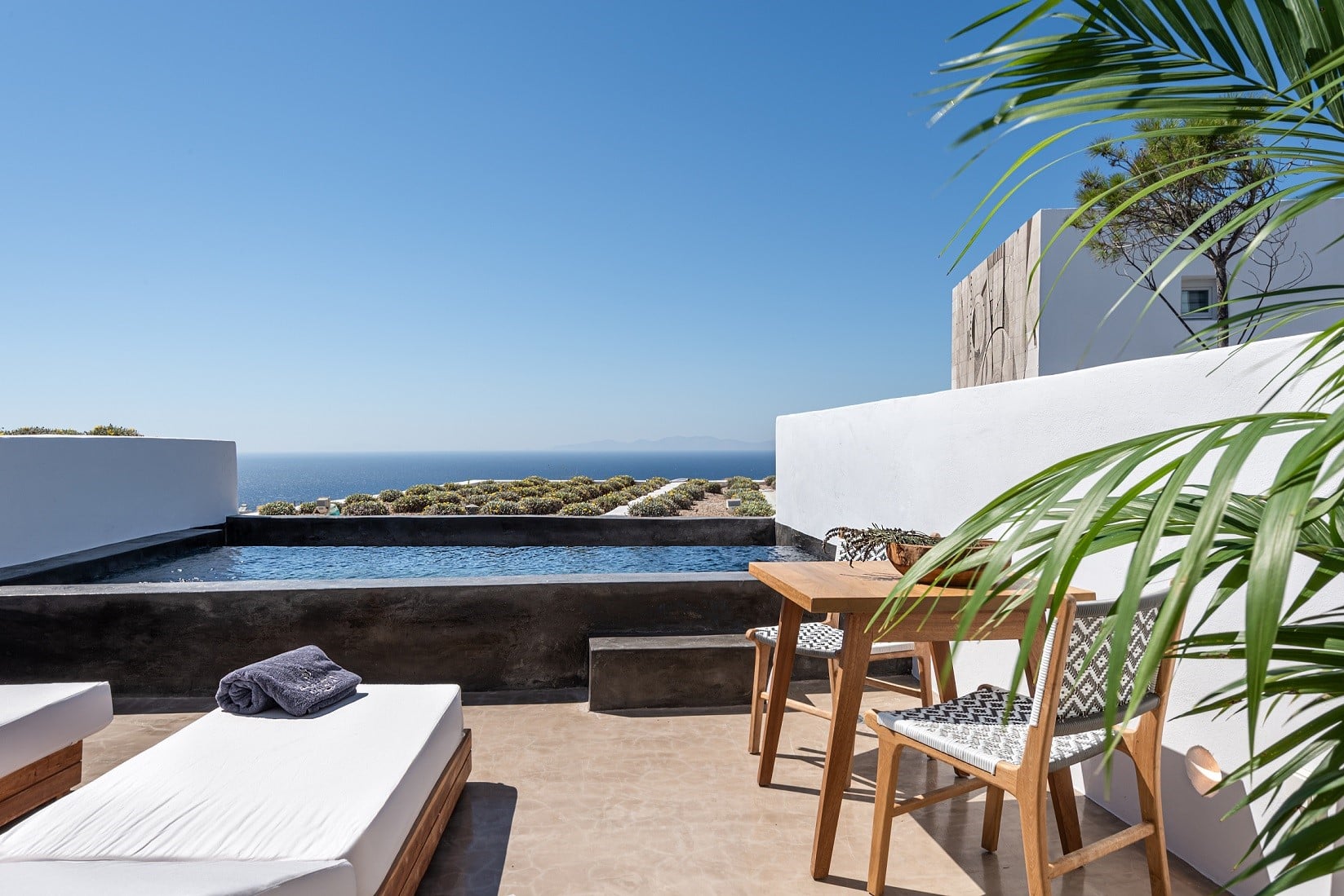 oia andronis luxury villas pools